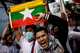 Protesters take part in a demonstration against the Myanmar military coup outside the Myanmar Embassy in Bangkok on February 7, 2021 [Jack Taylor/AFP]